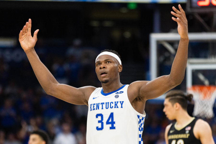 Kentucky Wildcats forward Oscar Tshiebwe (34) hypes up the crowd during the UK vs. Vanderbilt SEC Tournament quarterfinals mens basketball game on Friday, March 11, 2022, at Amalie Arena in Tampa, Florida. UK won 77-71. Photo by Michael Clubb | Staff