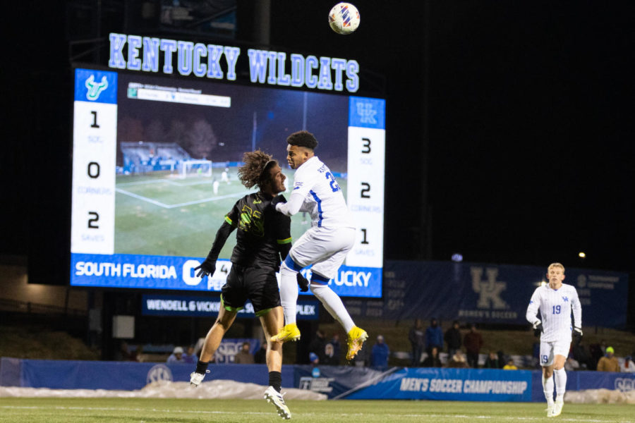 Kentucky Wildcats defender Taco Nsimpasi (23) heads the ball during the No. 1 Kentucky vs. South Florida mens soccer match in the second round of the NCAA tournament on Sunday, Nov. 20, 2022, at the Wendell & Vickie Bell Soccer Complex in Lexington, Kentucky. Kentucky won 4-0. Photo by Jackson Dunavant | Staff