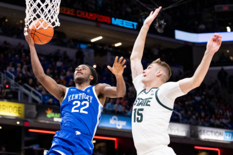 Kentucky Wildcats guard Cason Wallace (22) shoots the ball during the No. 4 Kentucky vs. Michigan State Champions Classic mens basketball game on Tuesday, Nov. 15, 2022, at Gainbridge Fieldhouse in Indianapolis. Michigan State won 86-77 in the second overtime. Photo by Jack Weaver | Staff