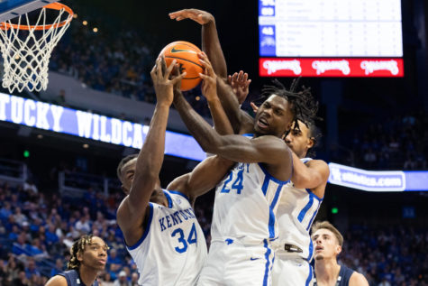 Kentucky Wildcats forwards Chris Livingston (24) and Oscar Tshiebwe (34) attempt to rebound the ball during the Kentucky vs. North Florida mens basketball game on Wednesday, Nov. 23, 2022, at Rupp Arena in Lexington, Kentucky. Kentucky won 96-56. Photo by Jackson Dunavant | Staff