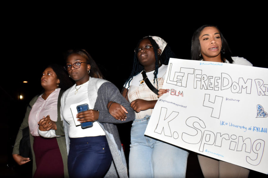 Betsy Spring, Kylah Spring, Kansas Perry and Mikiah Turner, left to right, march to the Bowman Statue at the March Against Racism on Monday, Nov. 7, 2022, at the University of Kentucky in Lexington, Kentucky. Photo by Abbey Cutrer | Staff