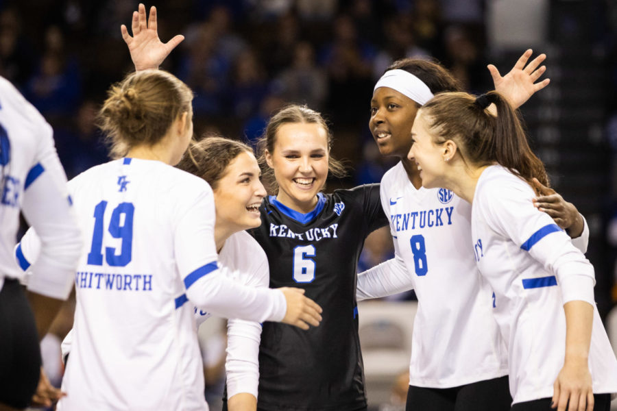 The Wildcats celebrate during the No. 10 Kentucky vs. Tennessee volleyball match on Wednesday, Nov. 16, 2022, at Memorial Coliseum in Lexington, Kentucky. Photo by Isabel McSwain | Staff