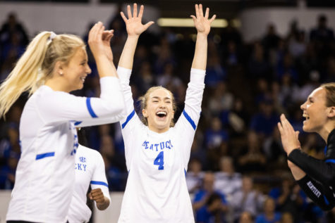 The Wildcats celebrate during the No. 10 Kentucky vs. Tennessee volleyball match on Wednesday, Nov. 16, 2022, at Memorial Coliseum in Lexington, Kentucky. Photo by Isabel McSwain | Staff