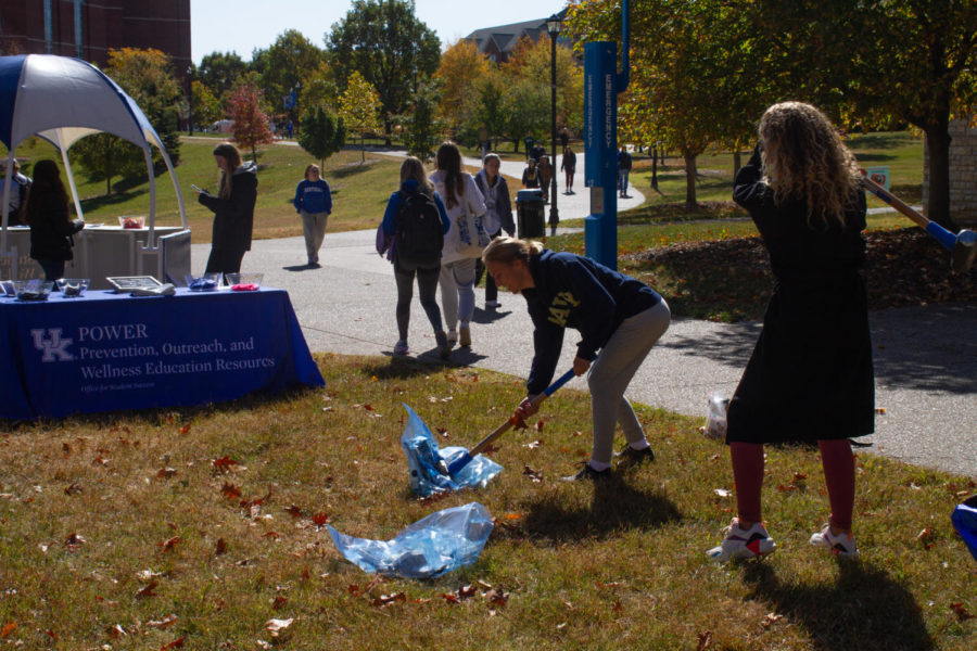 Students smash scales during a student wellness event, Scale Smash, in the William T. Young Library Walkway at the University of Kentucky in Lexington, KY, on Oct. 19, 2022. Photo by Maria Rauh | Staff