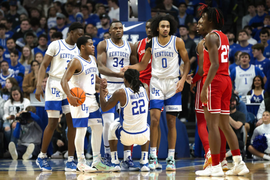 Kentucky players help up guard Cason Wallace (22) off the court during the No. 19 Kentucky vs. Louisville mens basketball game on Friday, Nov. 11, 2022, at Rupp Arena in Lexington, Kentucky. UK won 86-63. Photo by Jackson Dunavant | Staff