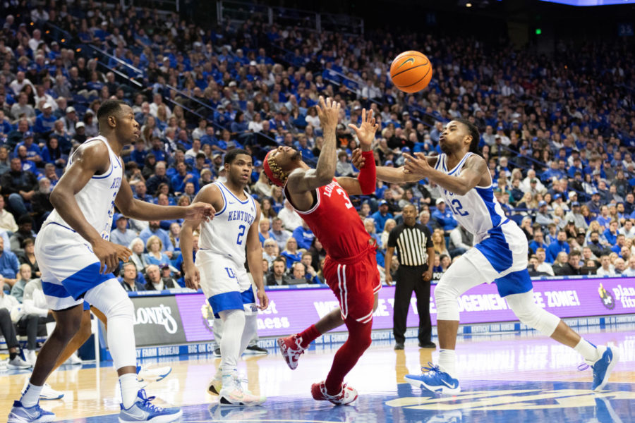 Kentucky Wildcats guard Cason Wallace (22) attempts to grab the ball during the No. 19 Kentucky vs. Louisville mens basketball game on Friday, Nov. 11, 2022, at Rupp Arena in Lexington, Kentucky. UK won 86-63. Photo by Jackson Dunavant | Staff