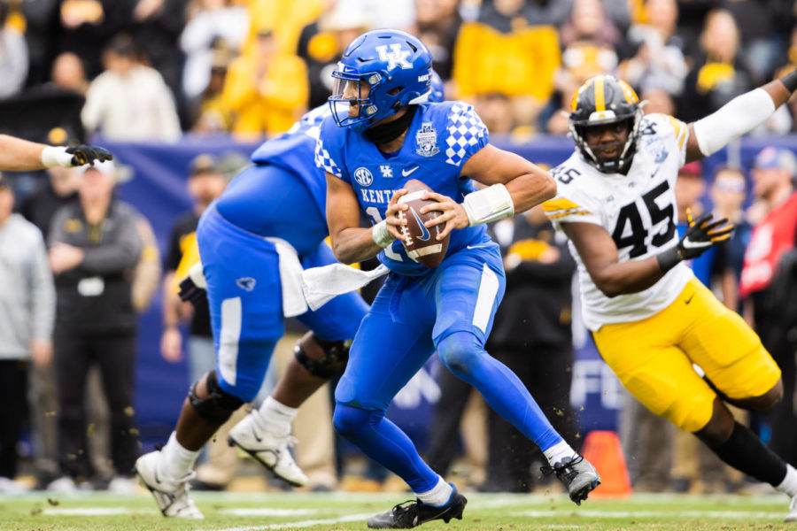 Kentucky Wildcats quarterback Destin Wade (15) looks to throw the ball during the Kentucky vs. Iowa Music City Bowl football game on Saturday, Dec. 31, 2022, at Nissan Stadium in Nashville, Tennessee. UK lost 21-0. Photo by Isabel McSwain | Staff