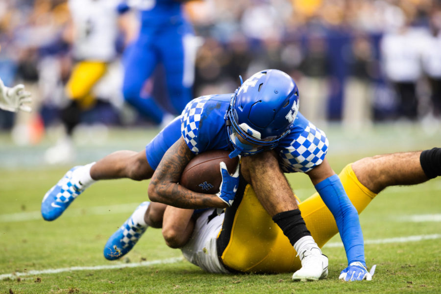 Kentucky Wildcats wide receiver Barion Brown (2) is tackled during the Kentucky vs. Iowa Music City Bowl football game on Saturday, Dec. 31, 2022, at Nissan Stadium in Nashville, Tennessee. UK lost 21-0. Photo by Isabel McSwain | Staff