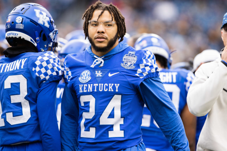 Kentucky Wildcats running back Chris Rodriguez Jr. (24) stands on the sidelines during the Kentucky vs. Iowa Music City Bowl football game on Saturday, Dec. 31, 2022, at Nissan Stadium in Nashville, Tennessee. UK lost 21-0. Photo by Isabel McSwain | Staff