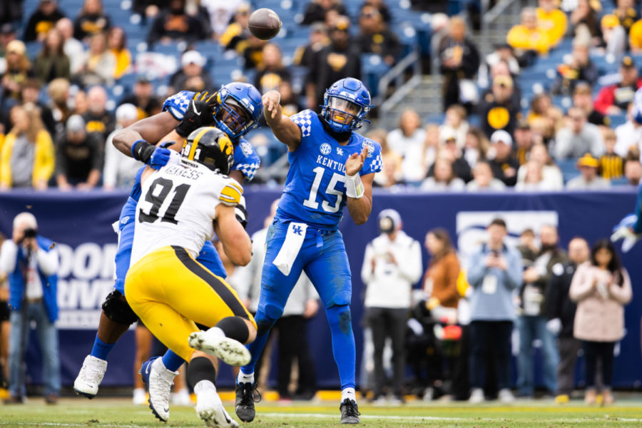 Kentucky Wildcats quarterback Destin Wade (15) throws as pass during the Kentucky vs. Iowa Music City Bowl football game on Saturday, Dec. 31, 2022, at Nissan Stadium in Nashville, Tennessee. UK lost 21-0. Photo by Isabel McSwain | Staff