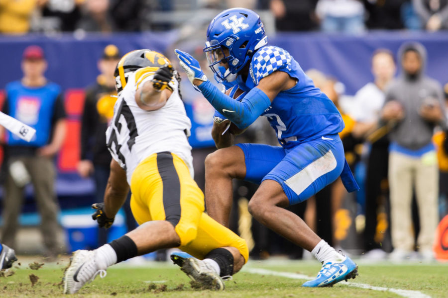 Kentucky Wildcats wide receiver Barion Brown (2) runs the ball during the Kentucky vs. Iowa Music City Bowl football game on Saturday, Dec. 31, 2022, at Nissan Stadium in Nashville, Tennessee. UK lost 21-0. Photo by Isabel McSwain | Staff