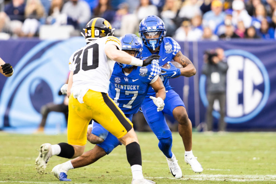 Kentucky+Wildcats+wide+receiver+Barion+Brown+%282%29+runs+the+ball+during+the+Kentucky+vs.+Iowa+Music+City+Bowl+football+game+on+Saturday%2C+Dec.+31%2C+2022%2C+at+Nissan+Stadium+in+Nashville%2C+Tennessee.+UK+lost+21-0.+Photo+by+Isabel+McSwain+%7C+Staff