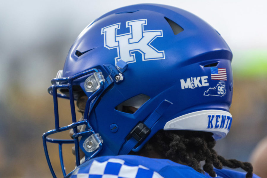 Kentucky players wear helmet stickers honoring the late Mississippi State head coach Mike Leach during the Kentucky vs. Iowa Music City Bowl football game on Saturday, Dec. 31, 2022, at Nissan Stadium in Nashville, Tennessee. UK lost 21-0. Photo by Travis Fannon | Staff