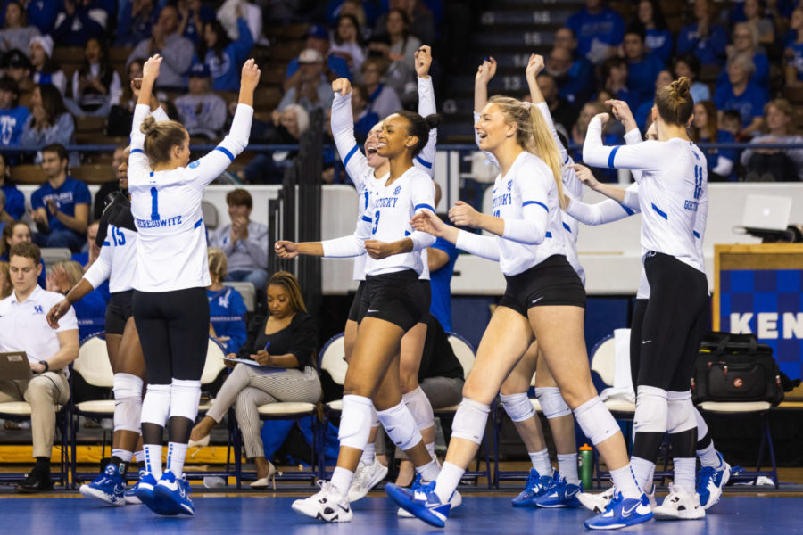The Wildcats celebrate during the No. 3 Kentucky vs. Loyola Chicago volleyball match in the first round of the NCAA Tournament on Thursday, Dec. 1, 2022, at Memorial Coliseum in Lexington, Kentucky. UK won 3-0. Photo by Isabel McSwain | Staff