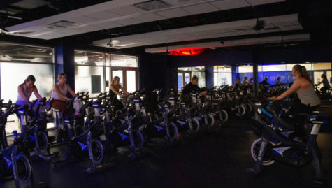 Students attend a morning cycling class at 7:30 a.m. on Monday, Nov. 14, 2022, at Alumni Gym in Lexington, Kentucky. Photo by Maria Rauh | Staff