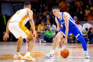 Kentucky Wildcats guard CJ Fredrick (1) dribbles the ball up the court during the Kentucky vs. No. 5 Tennessee mens basketball game on Saturday, Jan. 14, 2023, at Thompson-Boling Arena in Knoxville, Tennessee. Kentucky won 63-56. Photo by Jack Weaver | Staff