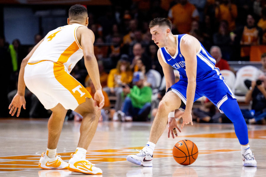 Kentucky Wildcats guard CJ Fredrick (1) dribbles the ball up the court during the Kentucky vs. No. 5 Tennessee mens basketball game on Saturday, Jan. 14, 2023, at Thompson-Boling Arena in Knoxville, Tennessee. Kentucky won 63-56. Photo by Jack Weaver | Staff