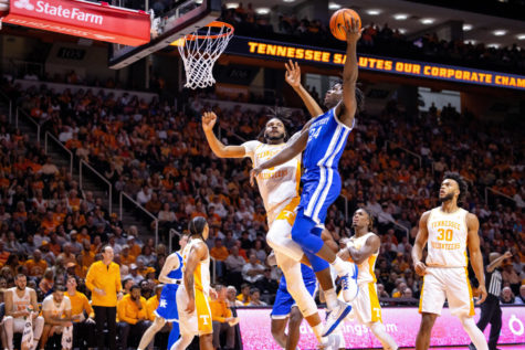 Kentucky Wildcats forward Chris Livingston (24) shoots the ball during the Kentucky vs. No. 5 Tennessee mens basketball game on Saturday, Jan. 14, 2023, at Thompson-Boling Arena in Knoxville, Tennessee. Kentucky won 63-56. Photo by Jack Weaver | Staff