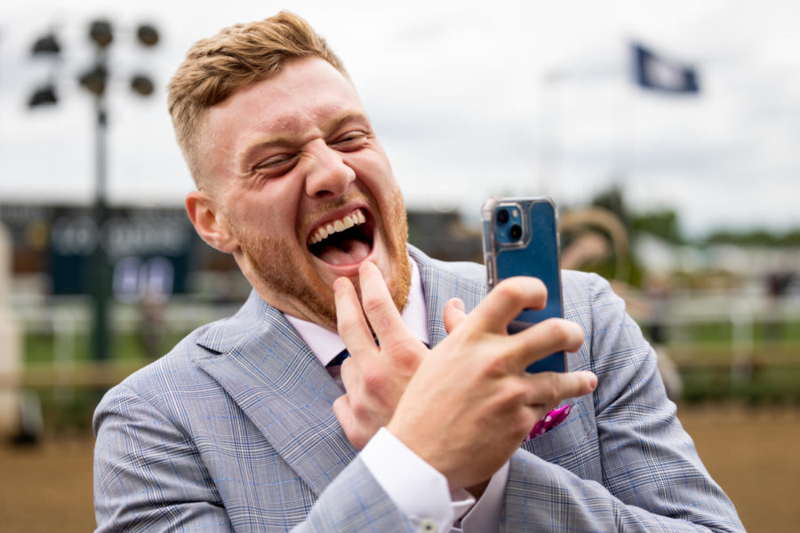 UK football quarterback Will Levis walks past the grandstand before the 148th running of the Kentucky Derby on Saturday, May 7, 2022, at Churchill Downs in Louisville, Kentucky. Photo by Jack Weaver | Staff