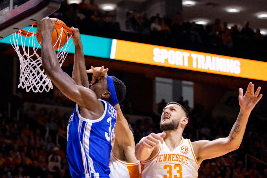Kentucky Wildcats forward Oscar Tshiebwe (34) dunks the ball during the Kentucky vs. No. 5 Tennessee mens basketball game on Saturday, Jan. 14, 2023, at Thompson-Boling Arena in Knoxville, Tennessee. Kentucky won 63-56. Photo by Jack Weaver | Staff