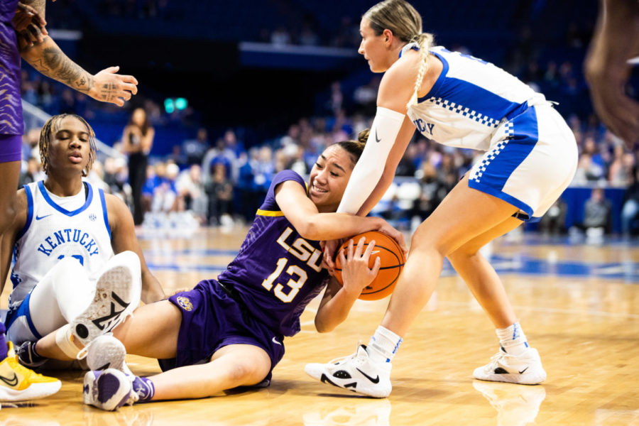 Kentucky Wildcats guard Maddie Scherr (22) attempts to regain possession of the ball during the Kentucky vs. No. 7 LSU womens basketball game on Sunday, Jan. 8, 2023, at Rupp Arena in Lexington, Kentucky. UK lost 67-48. Photo by Isabel McSwain | Staff