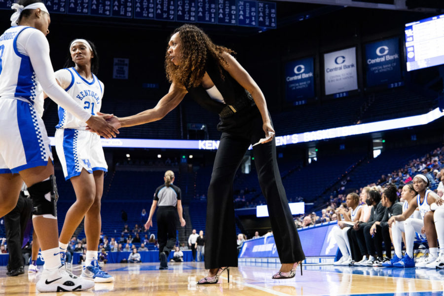 Kentucky Wildcats head coach Kyra Elzy gives a high five to a player during the Kentucky vs. No. 7 LSU womens basketball game on Sunday, Jan. 8, 2023, at Rupp Arena in Lexington, Kentucky. UK lost 67-48. Photo by Isabel McSwain | Staff
