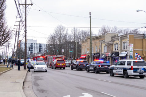 Police and EMS respond to the scene where a pedestrian was hit by a car at the corner of South Limestone Street and Prall Street on Monday, Jan. 9, 2023, in Lexington, Kentucky. Monday was the first day of spring semester classes. Photo by Travis Fannon | Kentucky Kernel