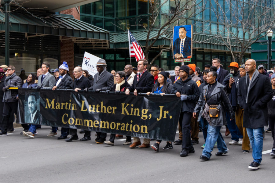Members of the Lexington community march in the MLK Freedom march on Monday, Jan. 16, 2023, in downtown Lexington, Kentucky. Photo by Travis Fannon | Staff