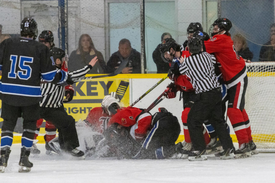 Players fight on the ice during the Kentucky vs. Louisville hockey game on Saturday, Jan. 21, 2023, at the Lexington Ice Center in Lexington, Kentucky. Kentucky won 7-2. Photo by Travis Fannon | Staff