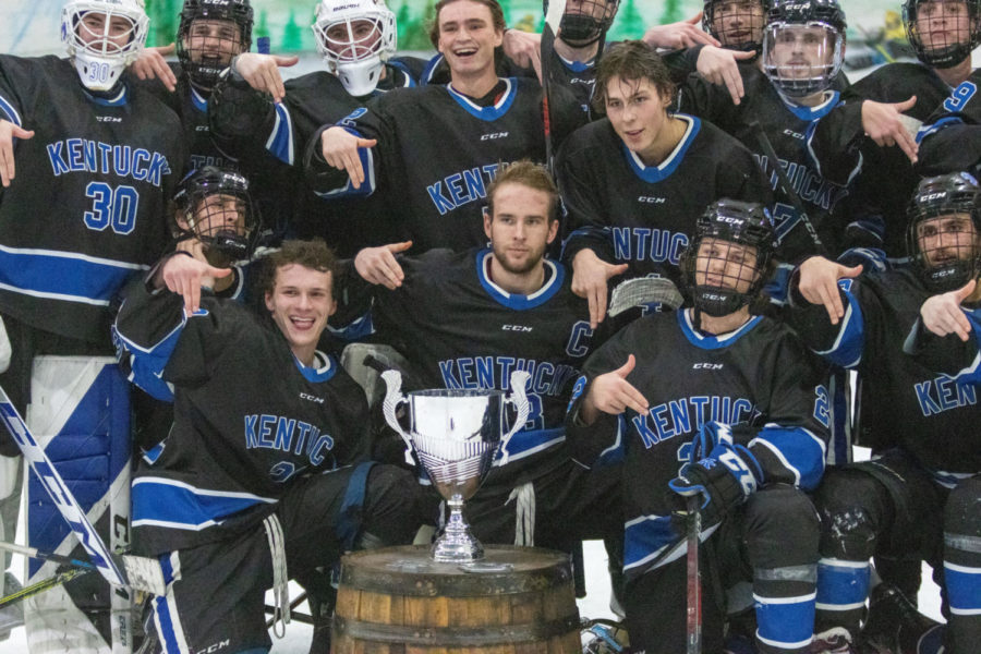 The Kentucky hockey team poses for a photo with the trophy at the Kentucky vs. Louisville hockey game on Saturday, Jan. 21, 2023, at the Lexington Ice Center in Lexington, Kentucky. Kentucky won 7-2. Photo by Travis Fannon | Staff