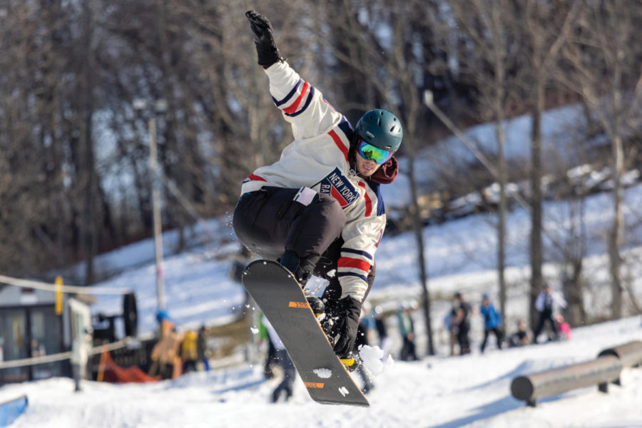 Maxwell Ricks, an Indiana University–Purdue University Indianapolis student, rides a snowboard on Saturday, Jan. 28, 2023, at Perfect North Slopes in Lawrenceburg, Indiana. Photo by Michael Smallwood | Staff