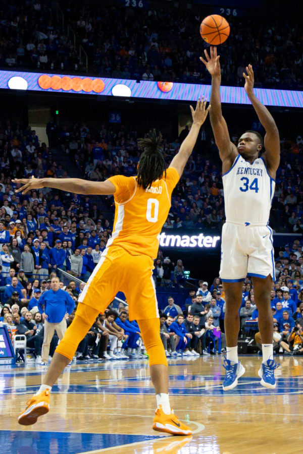 Kentucky Wildcats forward Oscar Tshiebwe (34) shoots the ball during the Kentucky vs. Tennessee mens basketball game on Saturday, Feb. 18, 2023, at Rupp Arena in Lexington, Kentucky. Kentucky won 66-54. Photo by Brady Saylor | Staff