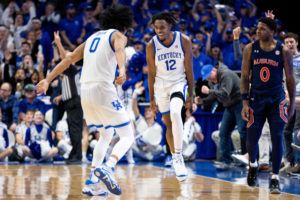 Kentucky Wildcats guard Antonio Reeves (12) celebrates after hitting a 3-pointer during the Kentucky vs. Auburn mens basketball game on Saturday, Feb. 25, 2023, at Rupp Arena in Lexington, Kentucky. Kentucky won 86-54. Photo by Jack Weaver | Staff