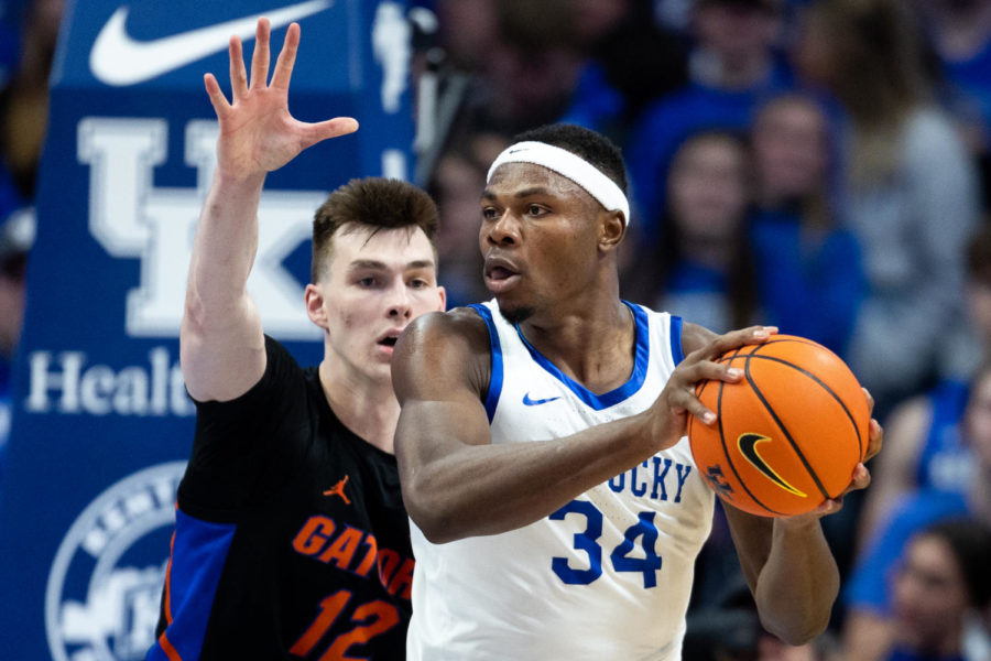 Kentucky Wildcats forward Oscar Tshiebwe (34) holds the ball during the Kentucky vs. Florida mens basketball game on Saturday, Feb. 4, 2023, at Rupp Arena in Lexington, Kentucky. Kentucky won 72-67. Photo by Jack Weaver | Staff