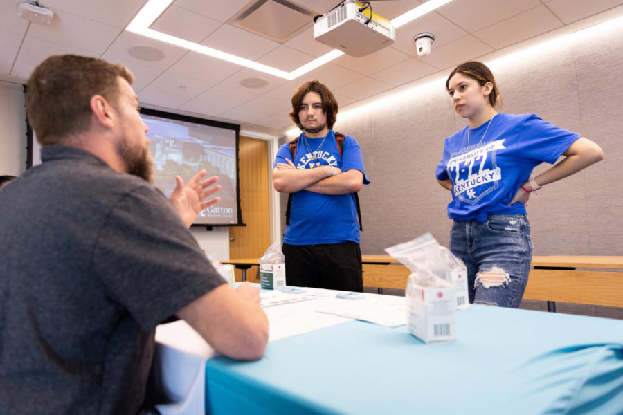 Freshman Jake Rodriquez and senior Vanessa Diaz receive Narcan training from Chad Baugh, a recovery coach for Voices of Hope, on Wednesday, Feb. 22, 2023, at the Gatton Student Center in Lexington, Kentucky. Photo by Jack Weaver | Staff