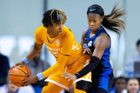 Kentucky Wildcats guard Robyn Benton (1) guards Tennessee Volunteers guard Jordan Houston (25) during the Kentucky vs. Tennessee womens basketball game on Sunday, Feb. 26, 2023, at Memorial Coliseum in Lexington, Kentucky. Tennessee won 83-63. Photo by Jack Weaver | Staff