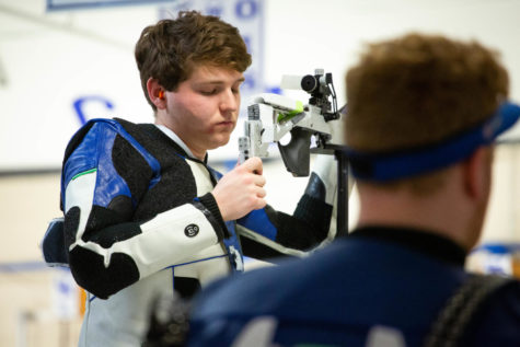 Kentucky Wildcats fifth year Mitchell Nelson adjusts his stock during the Kentucky vs. Morehead State rifle NCAA Qualifier on Saturday, Feb. 18, 2023, at Barker Hall in Lexington, Kentucky. Kentucky finished with a 4716 qualifying score. Photo by Samuel Colmar | Staff