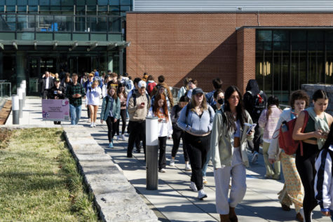 Students walk out of the Gatton Student Center on Tuesday, Feb. 21, 2023, in Lexington, Kentucky. Photo by Brady Saylor | Staff