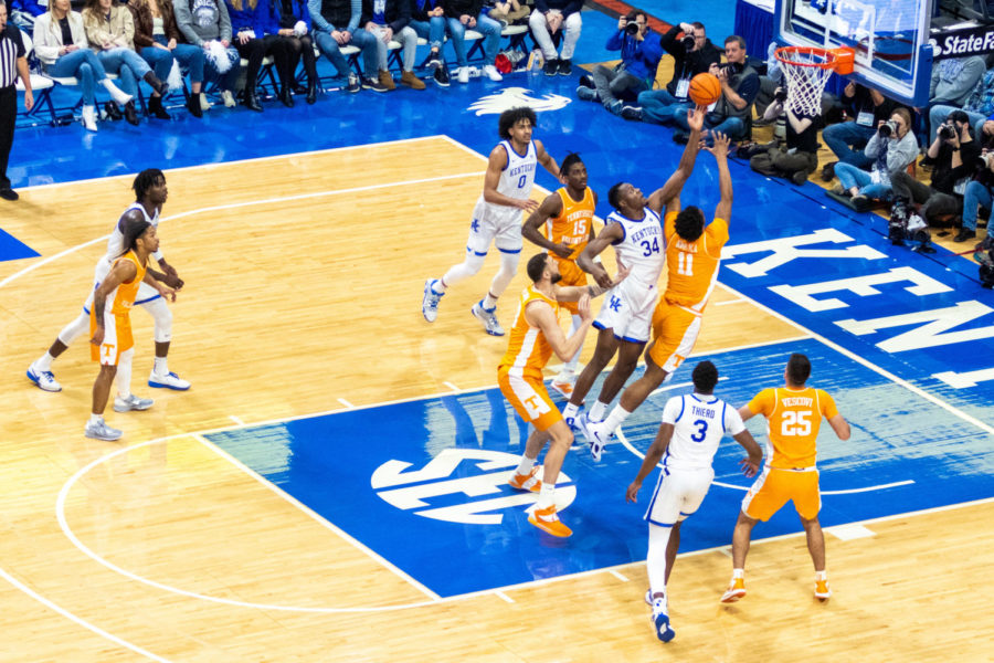 Kentucky Wildcats forward Oscar Tshiebwe (34) rebounds the ball during the Kentucky vs. No. 10 Tennessee mens basketball game on Saturday, Feb. 18, 2023, at Rupp Arena in Lexington, Kentucky. Photo by Travis Fannon | Staff