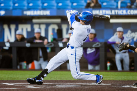 Kentucky Wildcats infielder Émilien Pitre (4) hits the ball during the Kentucky vs. Evansville home opener baseball game on Tuesday, Feb. 21, 2023, at Kentucky Proud Park in Lexington, Kentucky. Kentucky won 6-3. Photo by Isabel McSwain | Staff