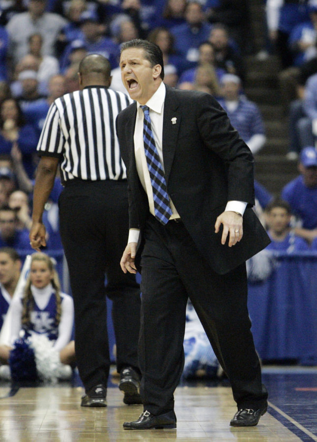 Kentucky Wildcats head coach John Calipari yells at his team in the second half of the No. 1 Kentucky vs. No. 2 West Virginia mens basketball game in the NCAA Tournament Elite 8 on Saturday, March 27, 2010, at the Carrier Dome in Syracuse, New York. Photo by Britney McIntosh | Kentucky Kernel