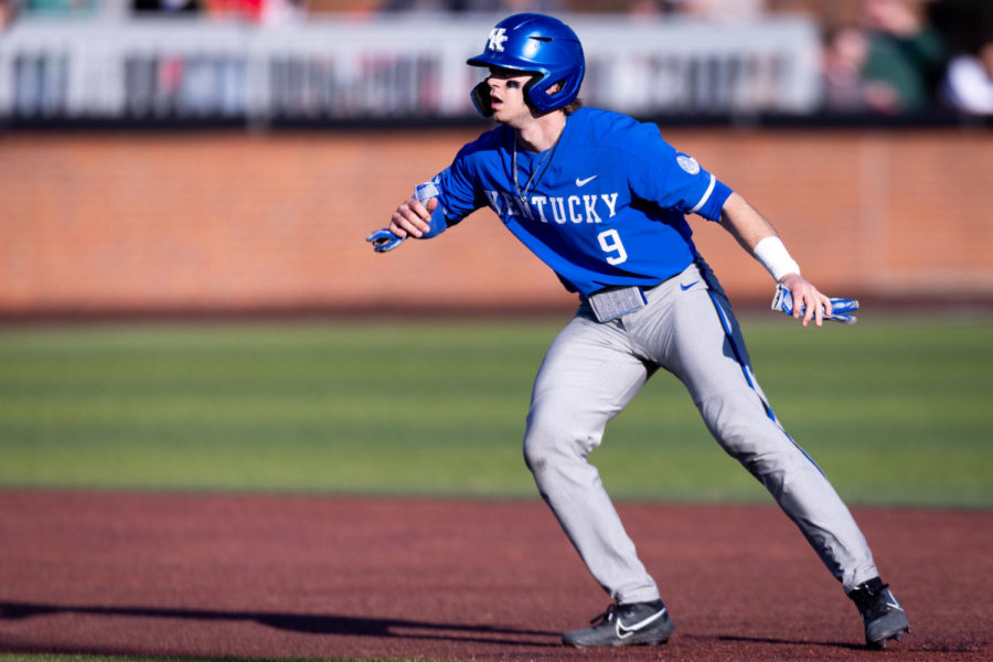 Kentucky Wildcats catcher Chase Stanke (9) leads off from second base during the No. 18 Kentucky vs. Western Kentucky baseball game on Tuesday, March 28, 2023, at Nick Denes Field in Bowling Green, Kentucky. Kentucky won 10-8. Photo by Jack Weaver | Staff