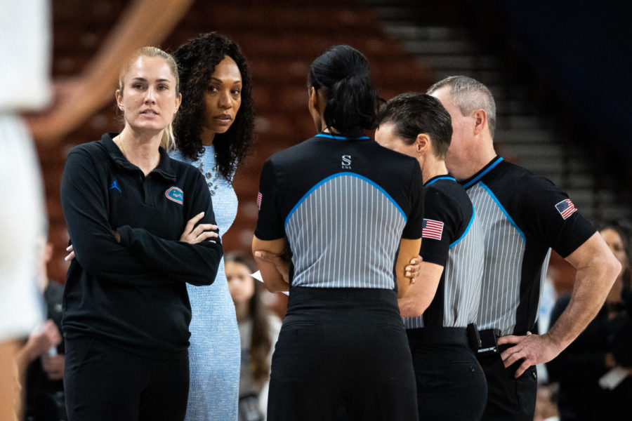 Kentucky Wildcats head coach Kyra Elzy glares towards the Florida bench after an altercation resulting in seven ejections during the Kentucky vs. Florida womens basketball game in the first round of the SEC Tournament on Wednesday, March 1, 2023, at Bon Secours Wellness Arena in Greenville, South Carolina. Photo by Carter Skaggs | Staff