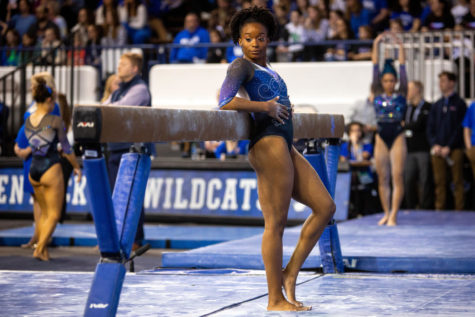 Kentucky Wildcats fifth year Arianna Patterson prepares to perform her beam routine during the No. 12 Kentucky vs. No. 9 Auburn gymnastics meet on Saturday, March 4, 2023, at Memorial Coliseum in Lexington, Kentucky. Kentucky won 197.675-196.450. Photo by Samuel Colmar | Staff