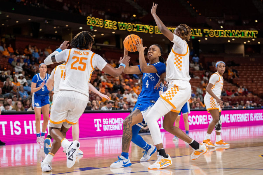 Kentucky Wildcats guard Eniya Russell (4) maneuvers through Tennessee Lady Volunteers players during the No. 14 Kentucky vs. No. 3 Tennessee womens basketball game in the SEC Tournament quarterfinals on Friday, March 3, 2023, at Bon Secours Wellness Arena in Greenville, South Carolina. Tennessee won 80-71. Photo by Carter Skaggs | Staff