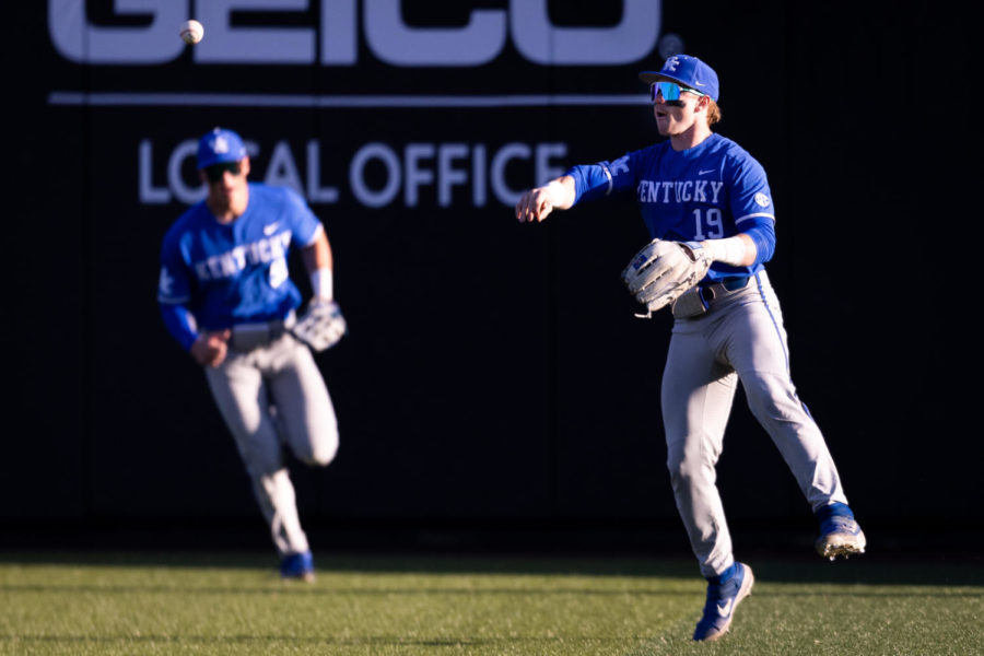 Kentucky Wildcats outfielder Nolan McCarthy (19) throws the ball into the infield during the No. 18 Kentucky vs. Western Kentucky baseball game on Tuesday, March 28, 2023, at Nick Denes Field in Bowling Green, Kentucky. Kentucky won 10-8. Photo by Jack Weaver | Staff