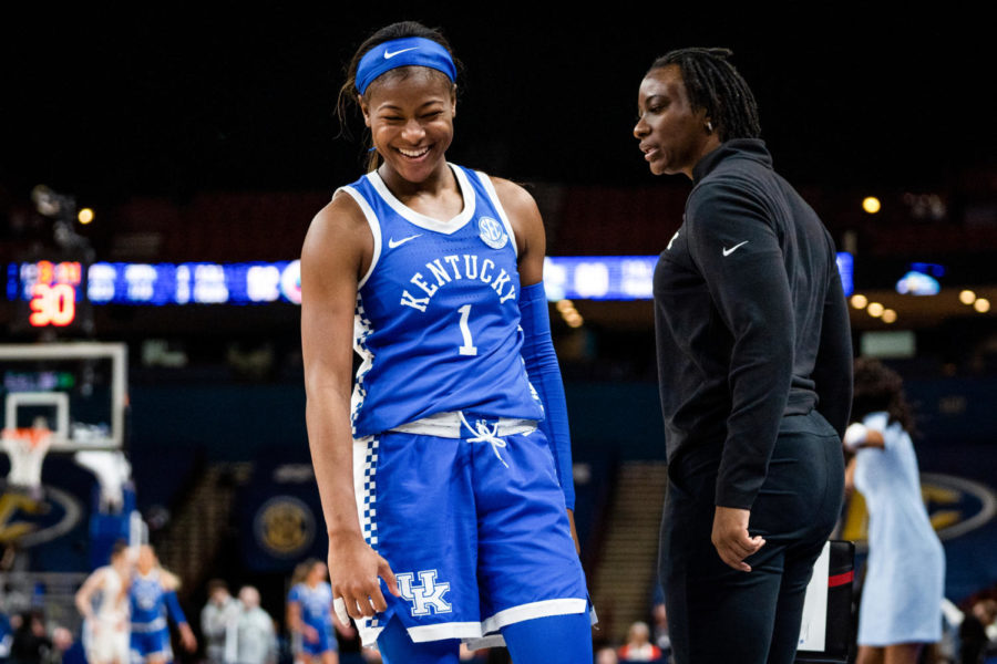 Kentucky Wildcats guard Robyn Benton (1) chest bumps assistant head coach Niya Butts during the Kentucky vs. Florida womens basketball game in the first round of the SEC Tournament on Wednesday, March 1, 2023, at Bon Secours Wellness Arena in Greenville, South Carolina. Photo by Carter Skaggs | Staff