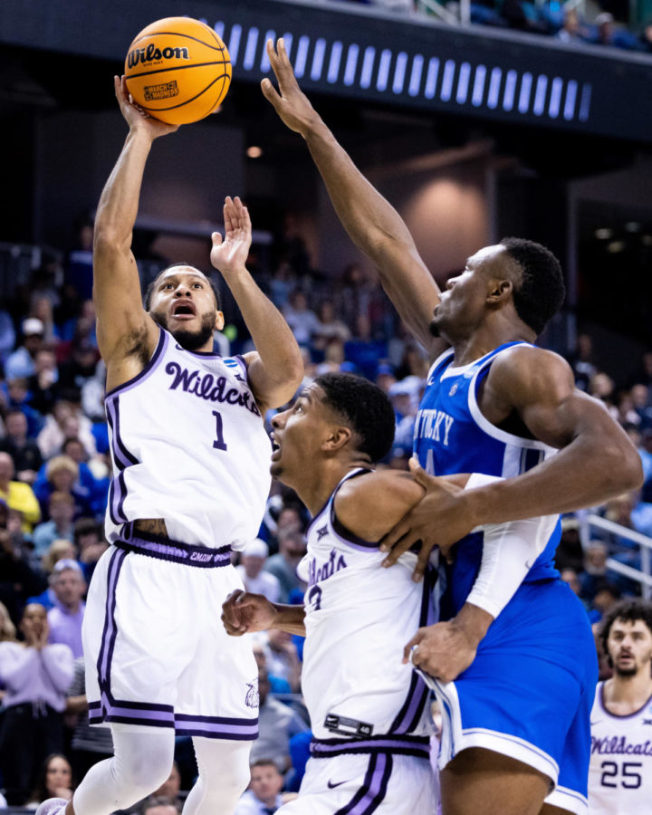 Kansas State Wildcats guard Markquis Nowell (1) shoots the ball during the No. 6 Kentucky vs. No. 3 Kansas State mens basketball game in the second round of the NCAA Tournament on Sunday, March 19, 2023, at Greensboro Coliseum in Greensboro, North Carolina. Kansas State won 75-69. Photo by Jack Weaver | Staff
