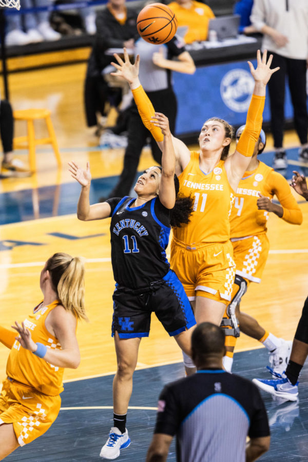 Kentucky Wildcats guard Jada Walker (11) fights for possession of the ball during the Kentucky vs. Tennessee womens basketball game on Sunday, Feb. 26, 2023, at Memorial Coliseum in Lexington, Kentucky. Tennessee won 83-63. Photo by Isabel McSwain | Staff