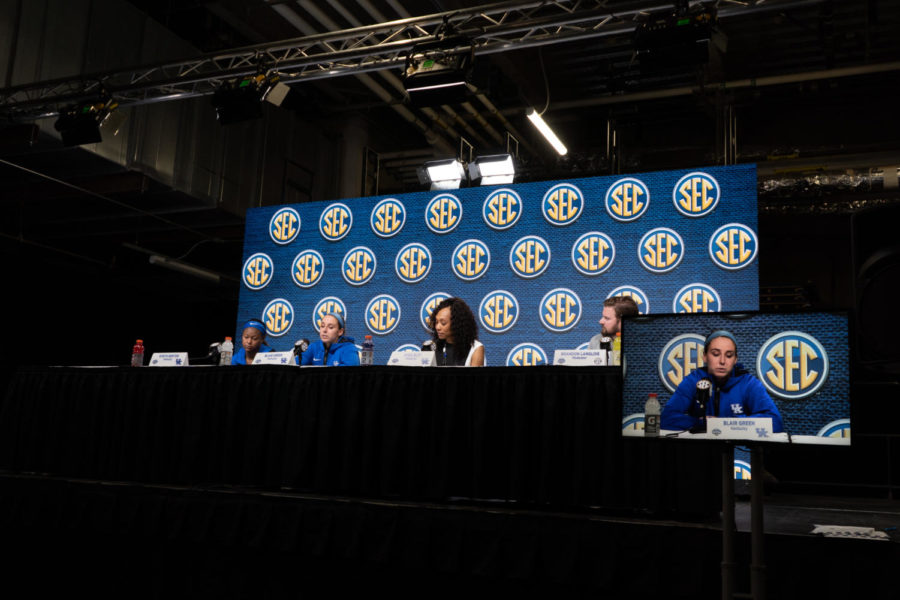 Kentucky Wildcats guard Robyn Benton (1), guard Blair Green (5) and head coach Kyra Elzy speak during a post-game press conference after the No. 14 Kentucky vs. No. 3 Tennessee womens basketball game in the SEC Tournament quarterfinals on Friday, March 3, 2023, at Bon Secours Wellness Arena in Greenville, South Carolina. Tennessee won 80-71. Photo by Carter Skaggs | Staff